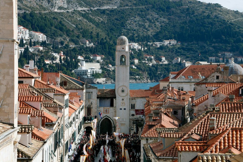 Scenic aerial view of Dubrovnik's iconic bell tower with surrounding architecture.